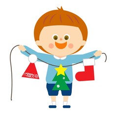 クリスマス飾りを広げて持つ男の子