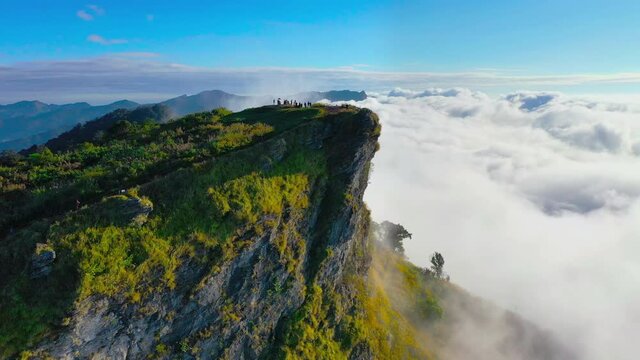 Sunrise and Mist mountain in Phu Chi Fa located in Chiang Rai, Thailand. Phu Chi Fa is the natural border between Thailand and Laos