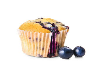 Tasty blueberry muffin on white background