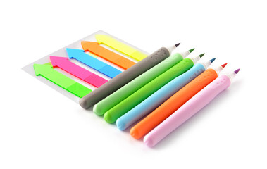 Felt tip pens and stickers on white background