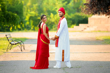 Beautiful Indian wedding couple on summer day