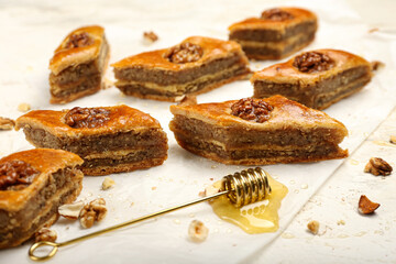Tasty baklava on light background