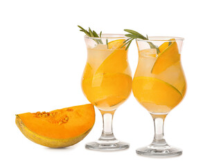 Glasses of cold melon cocktail on white background