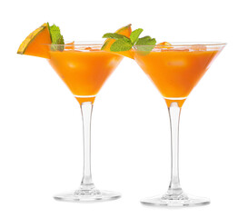 Glasses of cold melon cocktail on white background