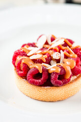 dessert tartlet with raspberries and caramel