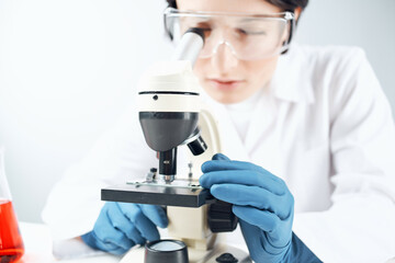woman laboratory assistant microscope science professional analysis biotechnology