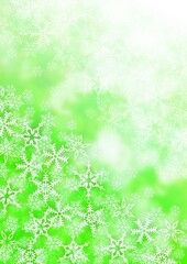 雪の結晶が散りばめられた緑色の背景