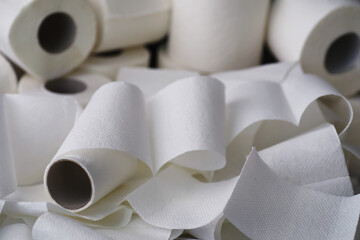 Toilet paper in a roll. Snow-white soft three-layer toilet paper. Lack of hygiene products. Primary protection and disinfection.