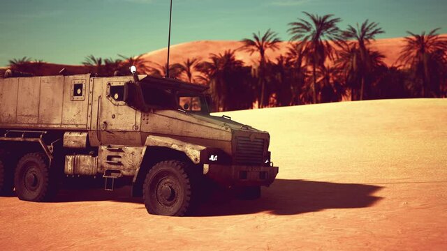 Armoured military truck in desert
