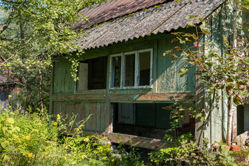 An old abandoned wooden house in the village