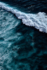 Fototapeta na wymiar Aerial view to waves in ocean Splashing Waves. Blue clean wavy sea water.