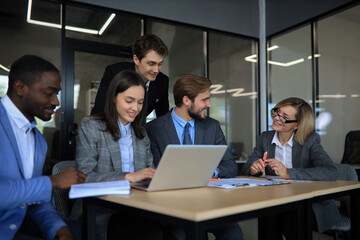 Business meeting - manager discussing work with his colleagues