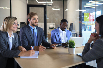 Job interview with the employer, businessman listen to candidate answers.