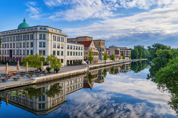 Germany,¬†Brandenburg,¬†Potsdam, City buildings reflecting in Havel river canal