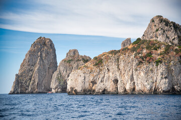 Fototapeta na wymiar View of famous Faraglioni rocks from the sea, Capri - Italy.