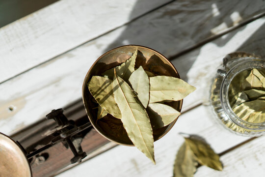 Sunlight on bay leaf kept in weight scale