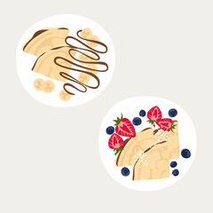 Sweet classic breakfast with pancakes. Thin pancakes with chocolate syrup and berries. strawberries, blueberries, bananas. Set of plates with beautiful breakfasts