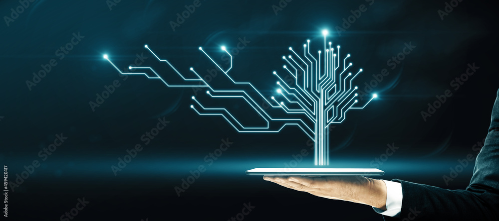 Poster close up of hand holding pad with abstract digital circuit tree on blurry blue background. informati