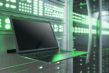 Side view of empty mock up laptop computer in modern server room interior. Internet, engineering and data concept. 3D Rendering.