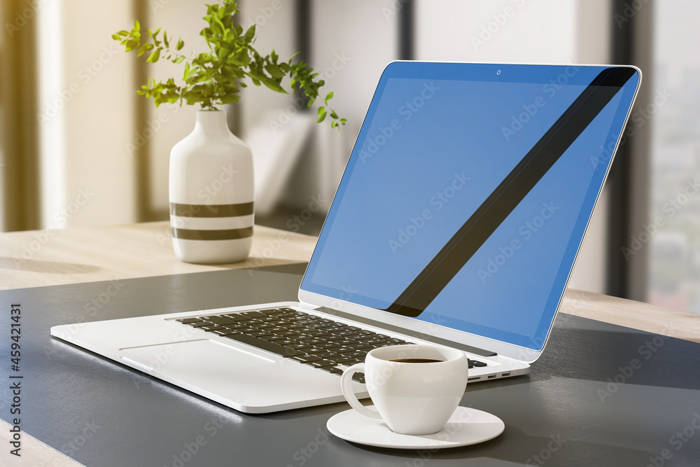Poster close up of laptop with reflections on screen and coffee cup on outdoor office workplace desktop wit