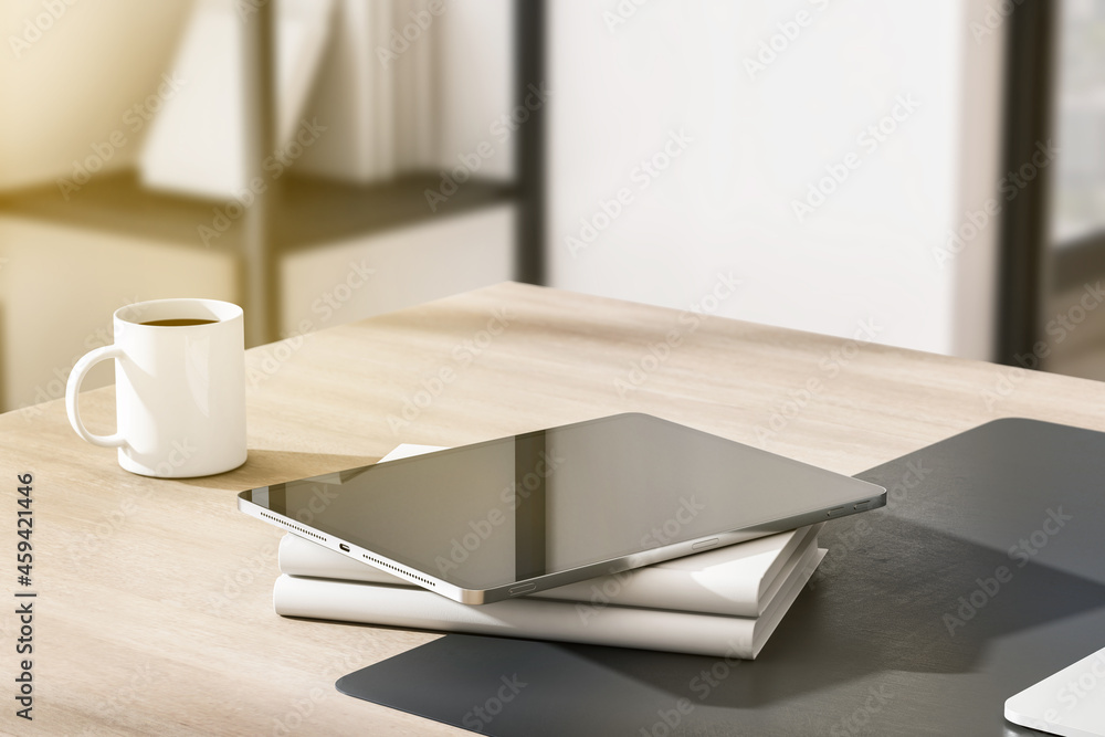 Poster close up of empty tablet with reflections, coffee cup and other items on wooden outdoor workplace ta