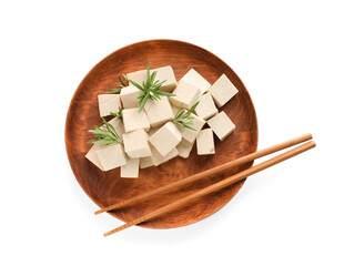 Wooden plate with delicious tofu, rosemary and chopsticks isolated on white, top view