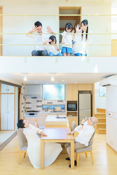 住宅の1Fと2Fに並ぶ3世代ファミリー