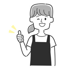 サムズアップをしているエプロンを着た店員