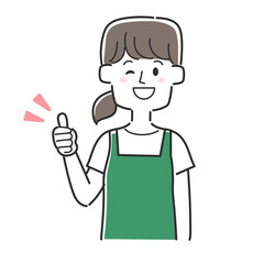 サムズアップをしているエプロンを着た店員