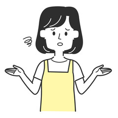 がっかりしているエプロンを着ている主婦