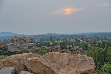 Monkeys on the background of the Hampi Valley