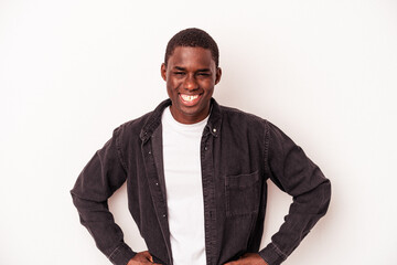 Young African American man isolated on white background confident keeping hands on hips.