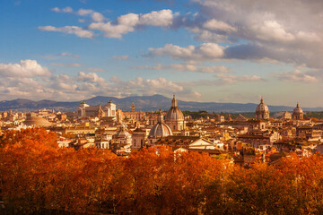 Autumn in Rome. View of the historical center skyline just before sunset with old monuments,...