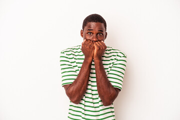 Young African American man isolated on white background biting fingernails, nervous and very anxious.