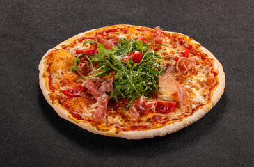 Pizza with parma and rucola
