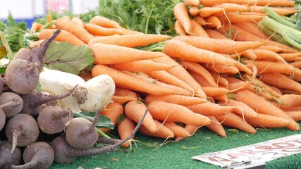 Organic vegetables on counter, fresh local produce homegrown raw veggies on marketplace stall....