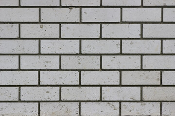 Horizontal texture of the brickwork of buildings, houses or fences