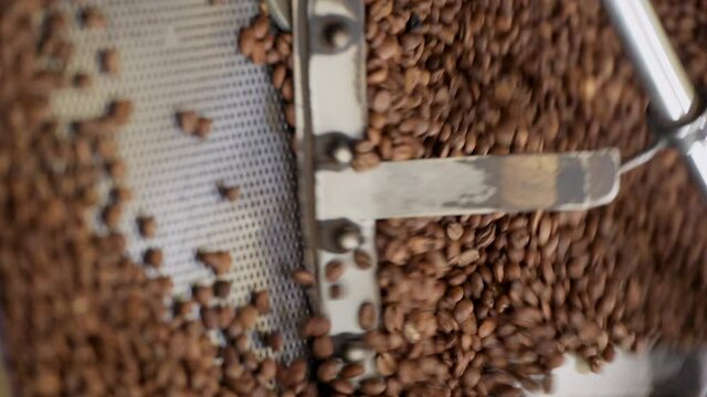 Overhead View Of Coffee Beans In Roaster / Vertical Video 