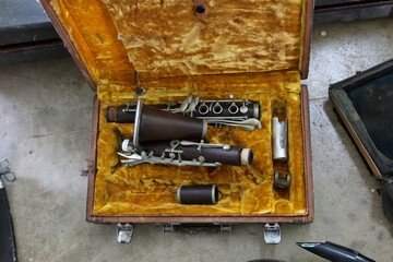 old clarinet instrument in box
