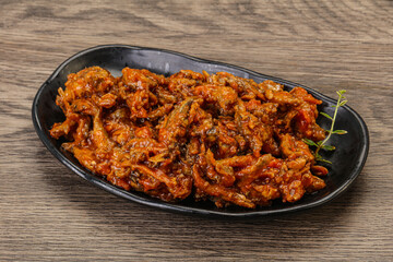 Canned anchovy in tomato sauce