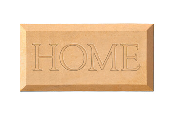 An isolated plaque or name plate with word 'home' engraved on it.