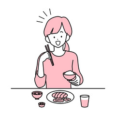 食事をする若い女性