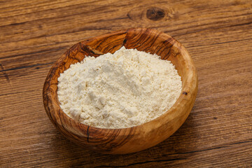 Wheat flour heap in the bowl