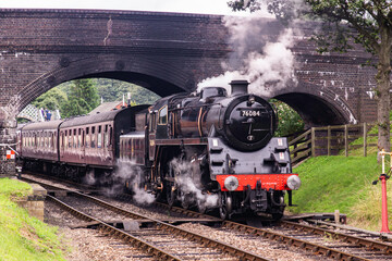 BR Standard 4 – 76084 pulling a rake of carriages