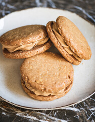 Homemade Peanut butter cookie dessert with nut cream