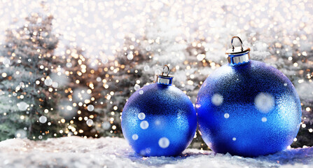 Glitter blue Christmas balls on snow