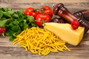 Italian pasta raw Maccheroni for cooking