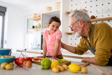 Happy grandparent playing, having fun with grandchildren