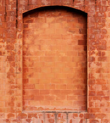Orange old brick wall background with blank block wall for advertising image.