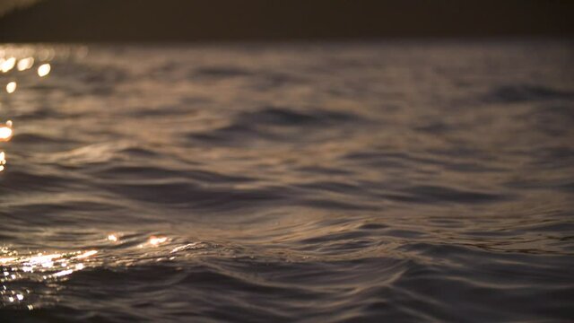 Ocean sunset waves in slow motion